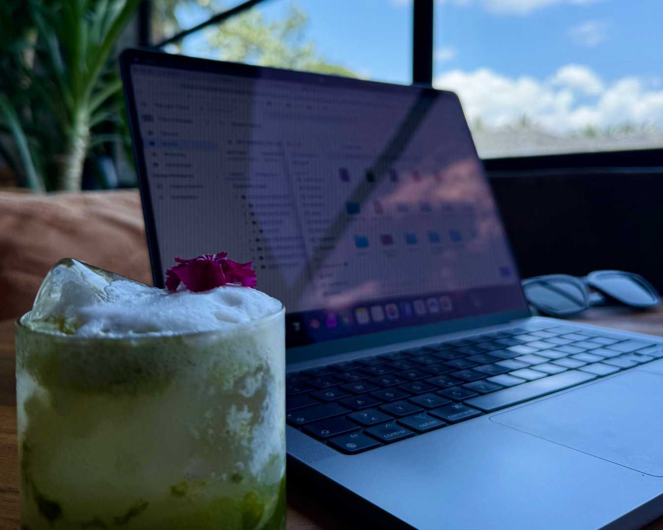 Digital nomad overlooking rice terraces while working remotely in Ubud Bali