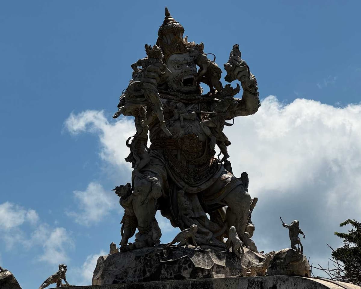 Uluwatu Temple perched on a limestone cliff at sunset in Bali